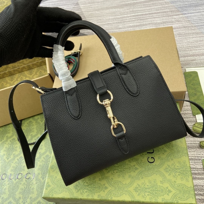 G*u*i top handle bags